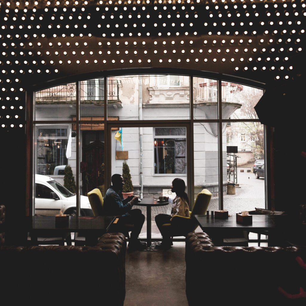 adorable-couple-sitting-cafe