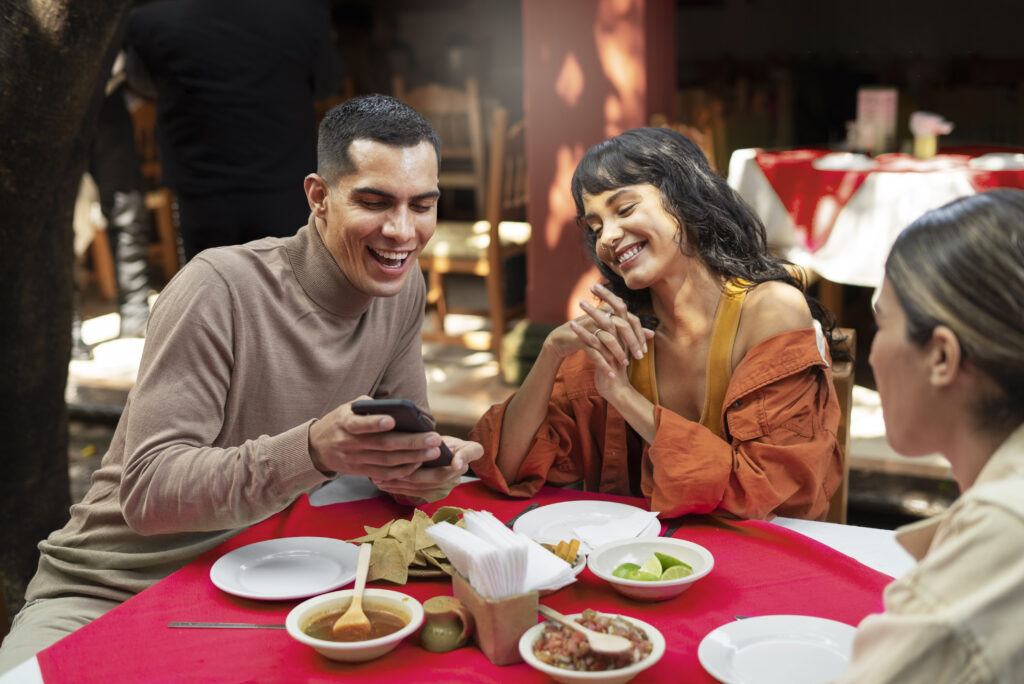 adults-enjoying-mexican-food