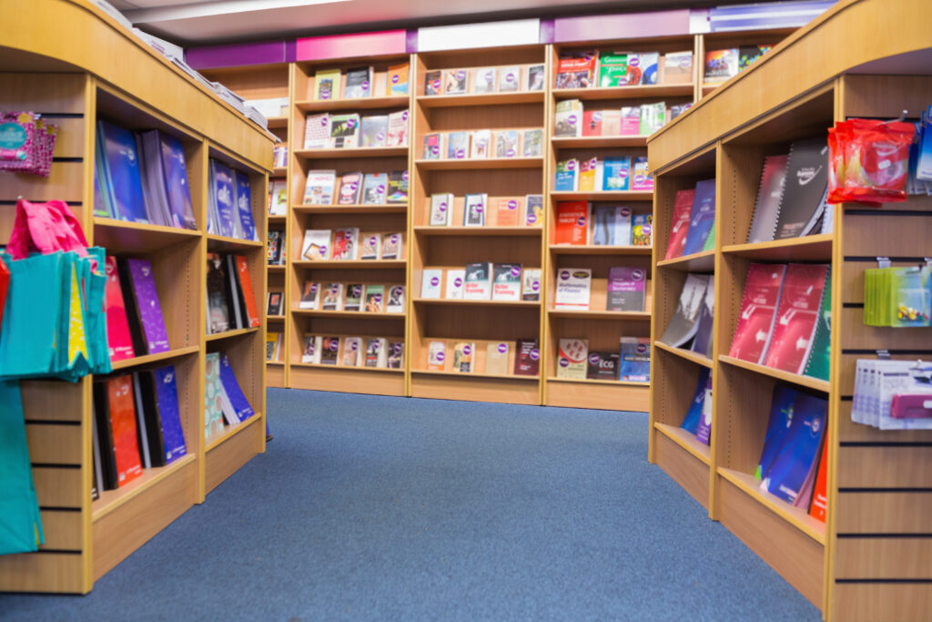 Books arranged in shelf at library
