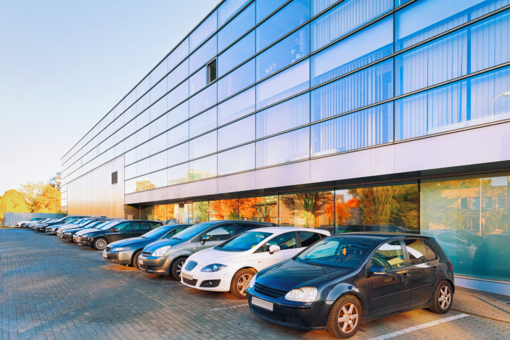 Cars parked on street at Office corporate building
