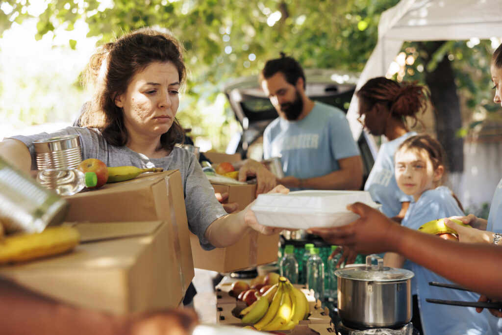 Friendly volunteers provide free meals