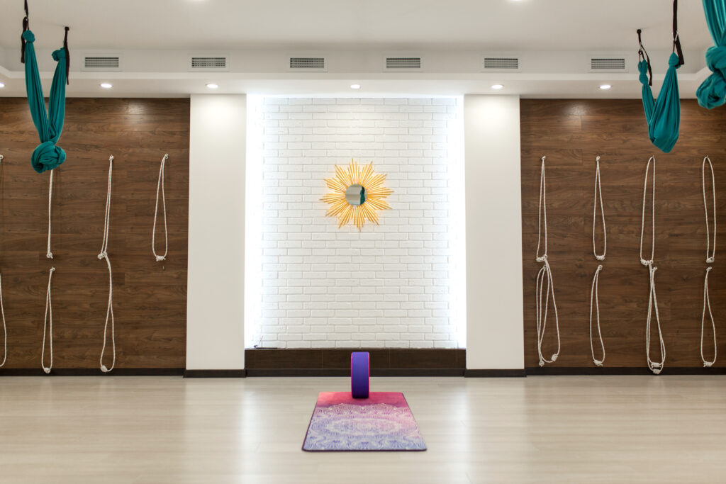 Empty yoga and fitness gym. Sport playground interrior