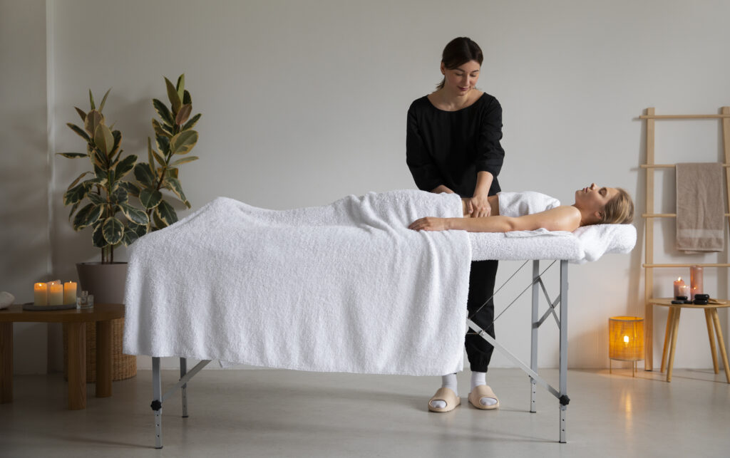 female-masseur-giving-back-massage-client