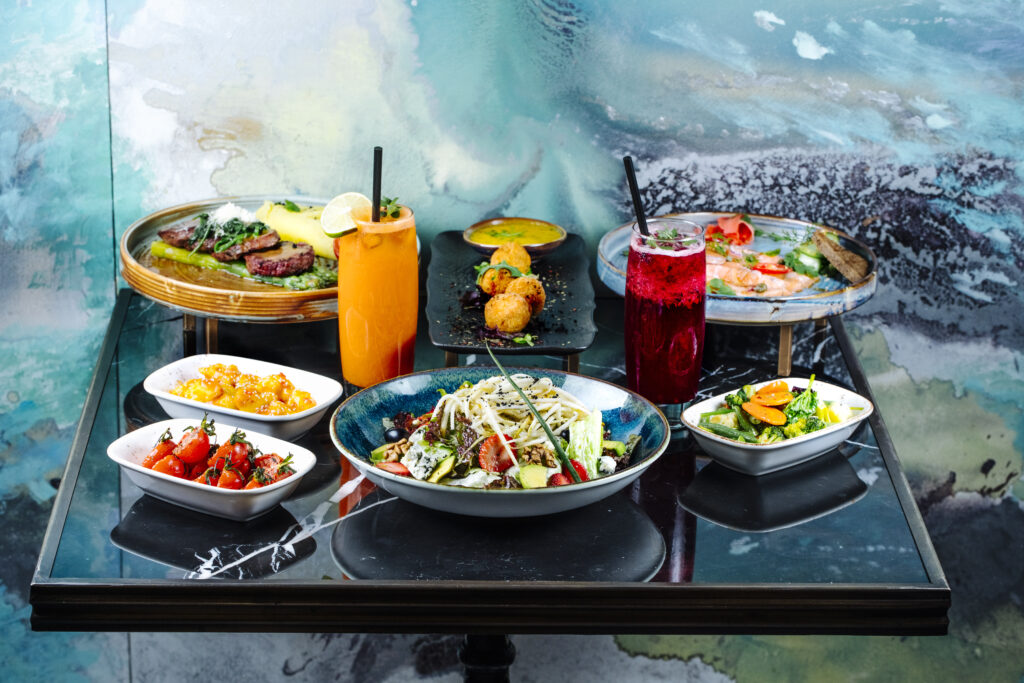 front view served table with cocktails