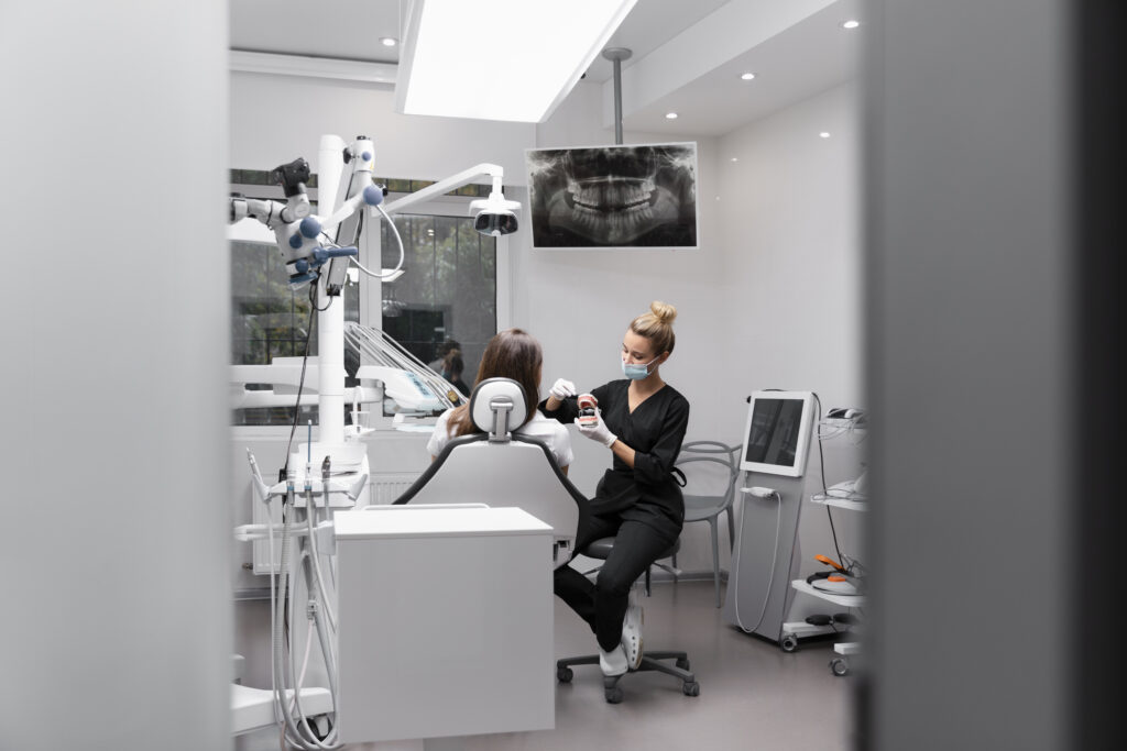 full-shot-dentist-with-patient
