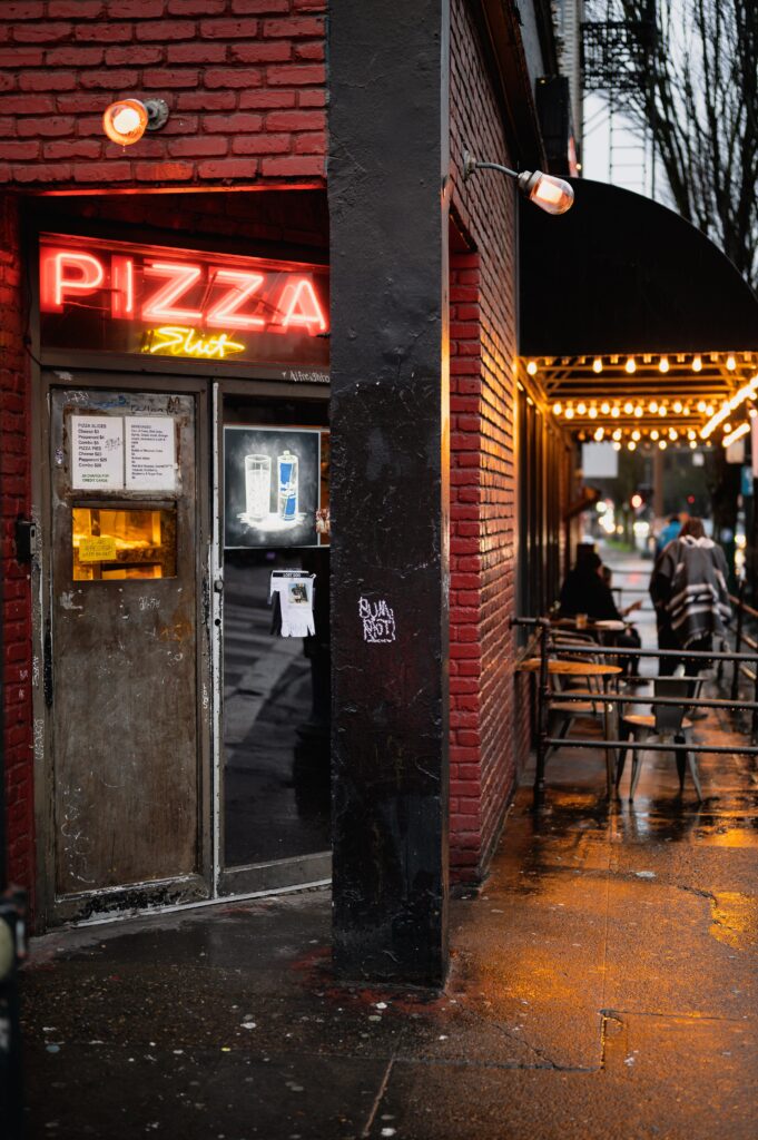 photo-pizza-shop-with-neon-signage-photo