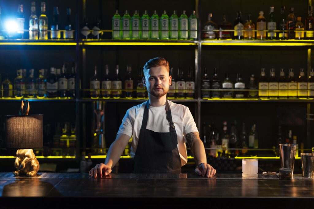portrait-male-bartender-waiting-his-clients