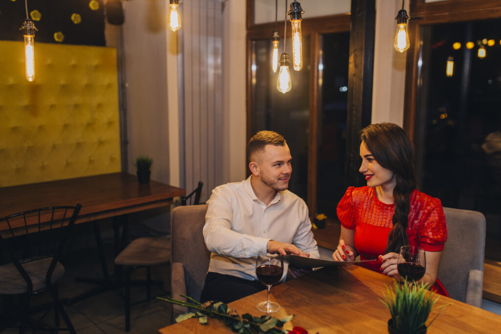 relaxing-couple-enjoying-dinner-cafe