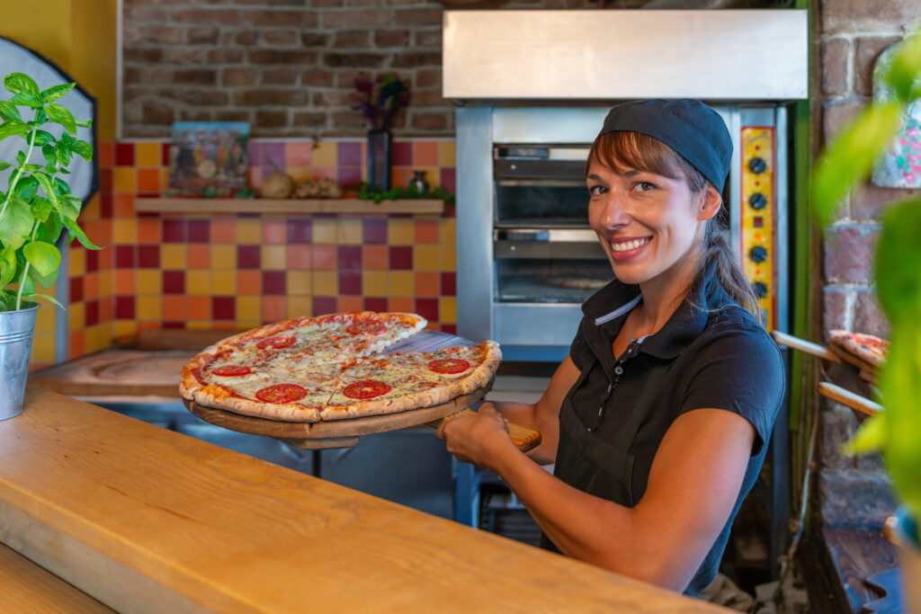 Serving delicious pizza slices.