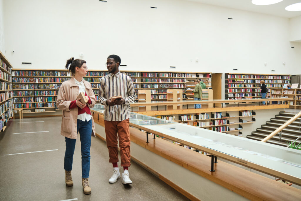 Couple walking in the library
